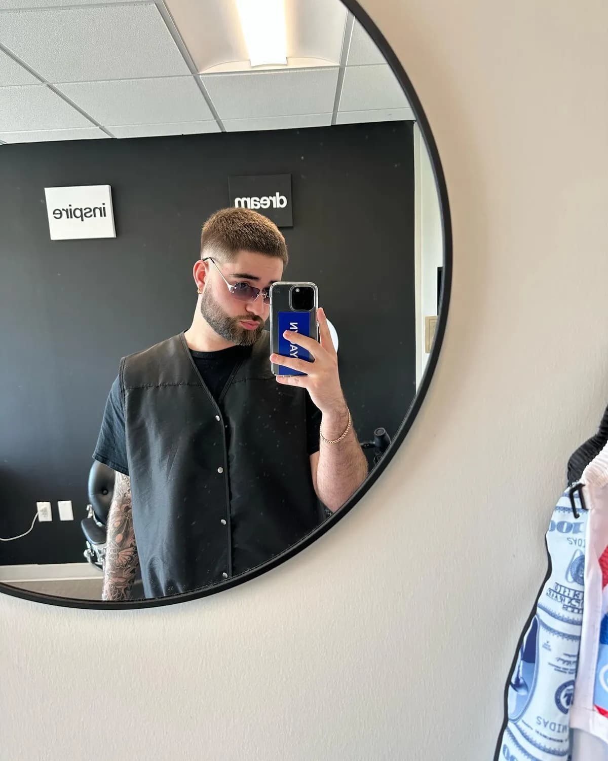 Ace of Fadez barber detailing a client's cut